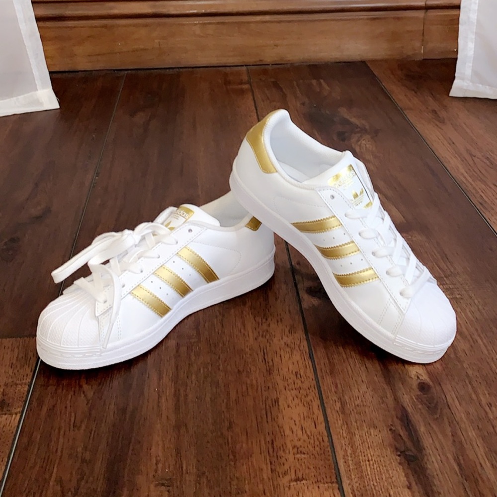 Brand new gold adidas